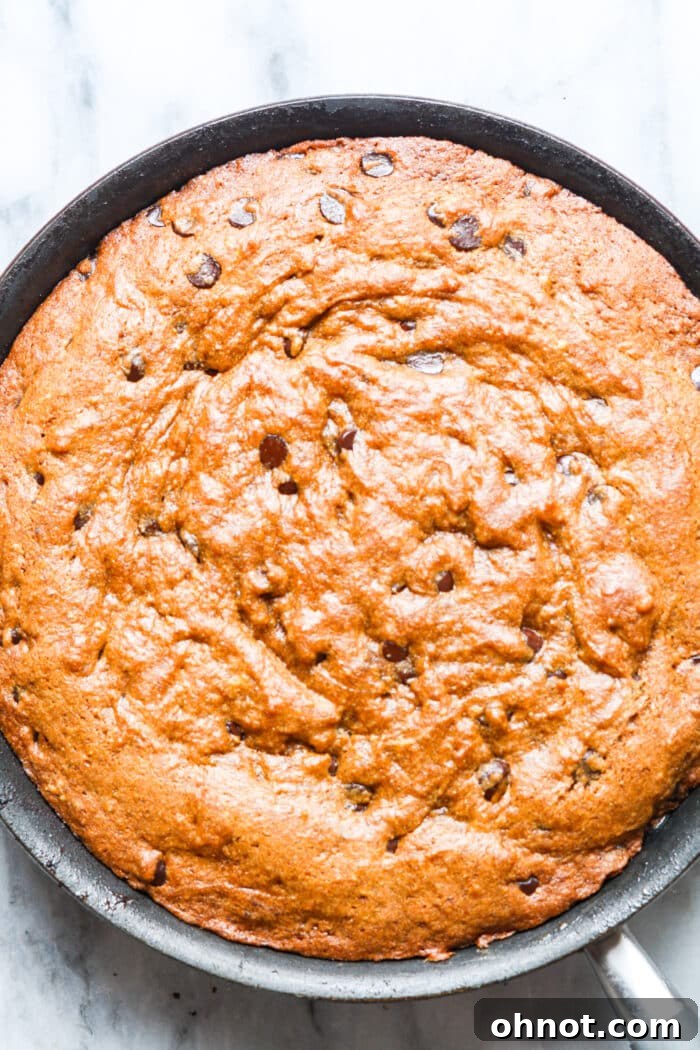 Baked pumpkin skillet cookie in the pan, ready to serve.