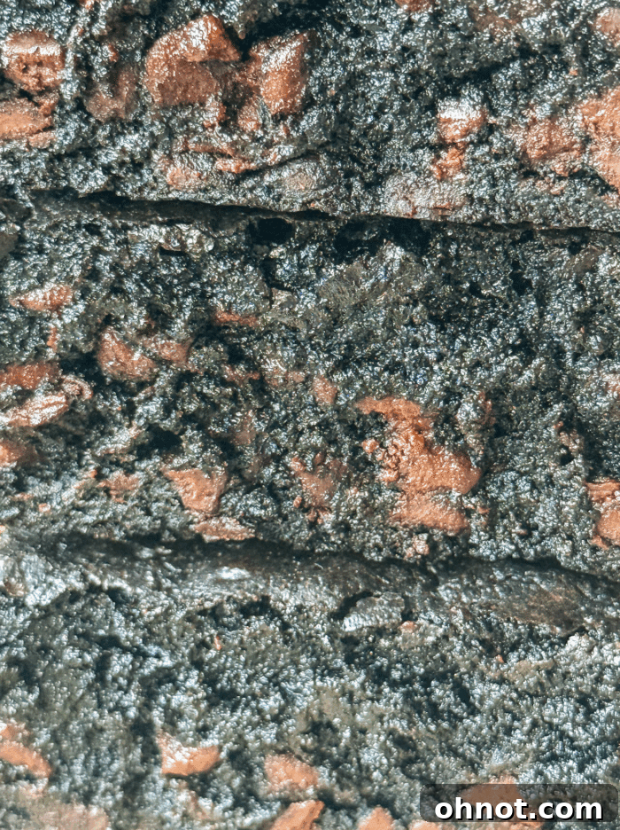 Close up of a square of fudgy brown butter brownie.