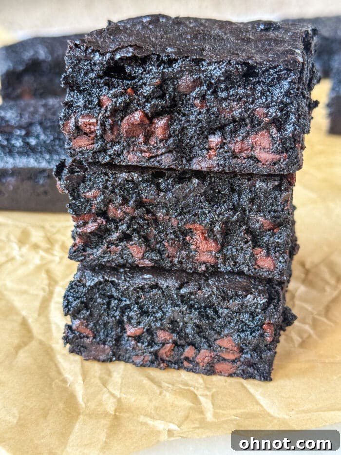 A batch of rich, dark brown butter brownies cut into squares.