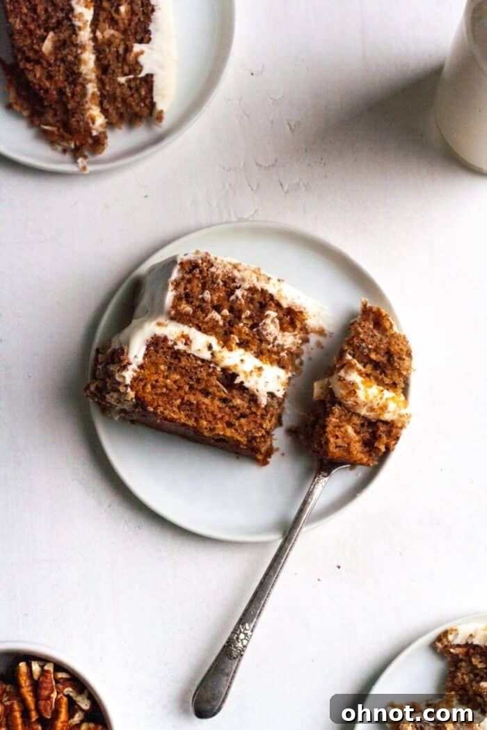 Paleo Hummingbird Cake slices on white plates.