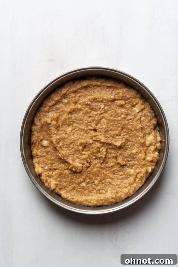 Hummingbird cake batter in a cake pan.