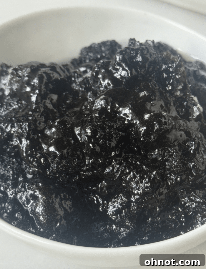 Extremely close-up shot of the fudgy, gooey center of the brownie pudding.