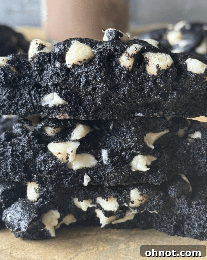 Stacked black and white cookies.