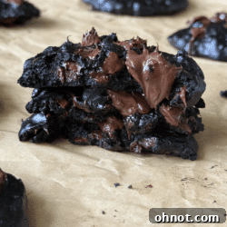 Stack of fudgy chocolate protein cookies, perfect for a healthy snack