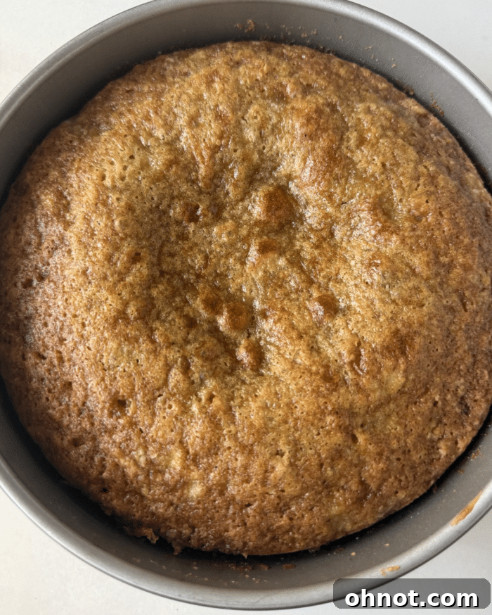 A circular pan with the freshly baked banana upside down cake inside, ready to be inverted.