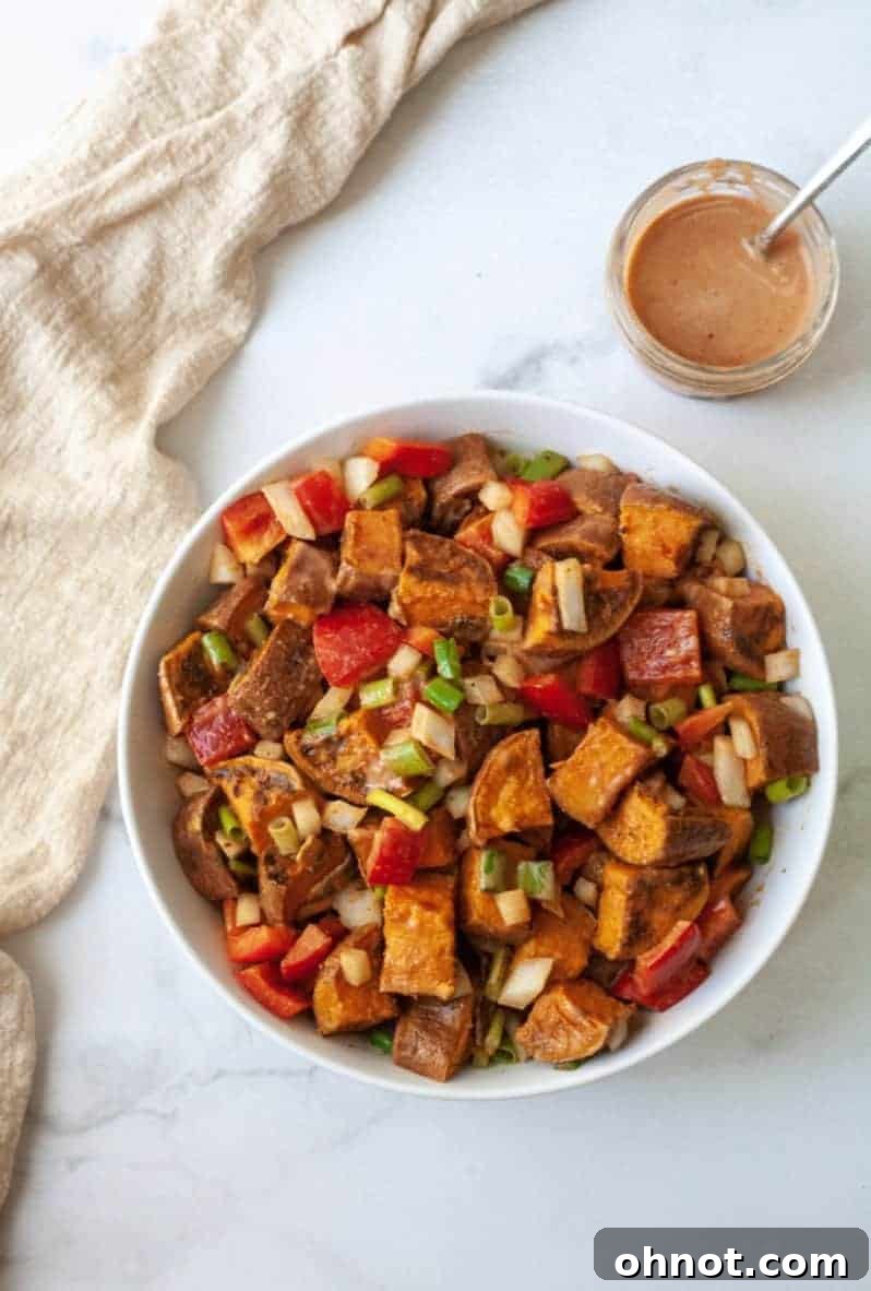 A final close-up of the fully dressed Southwestern Sweet Potato Salad ready to be served.