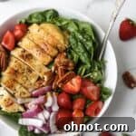 Whole30 salad with grilled chicken and strawberries