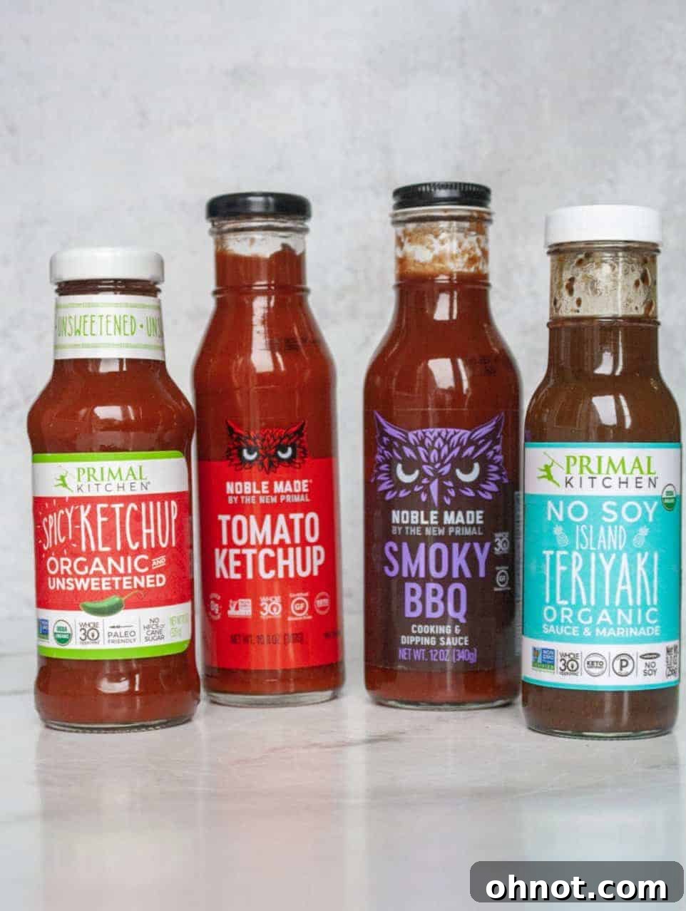 Selection of Whole30 approved products including condiments, ghee, and nut butters