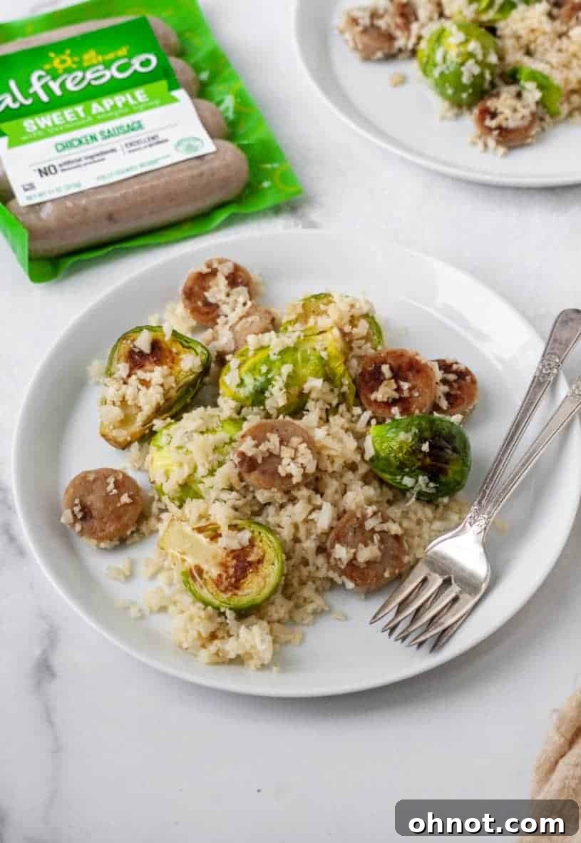 One-Skillet Sausage and Brussels Sprouts with Cauliflower Rice, cooked and perfectly combined in the skillet.