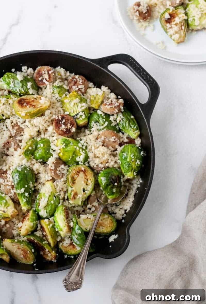 The finished One-Skillet Sausage and Brussels Sprouts with Cauliflower Rice, beautifully plated for serving.