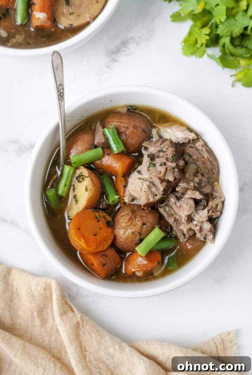 Close up shot of Whole30 Vegetable Pork Soup in a bowl