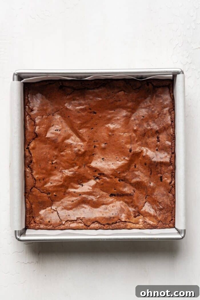 Paleo brownies baking in a pan in the oven