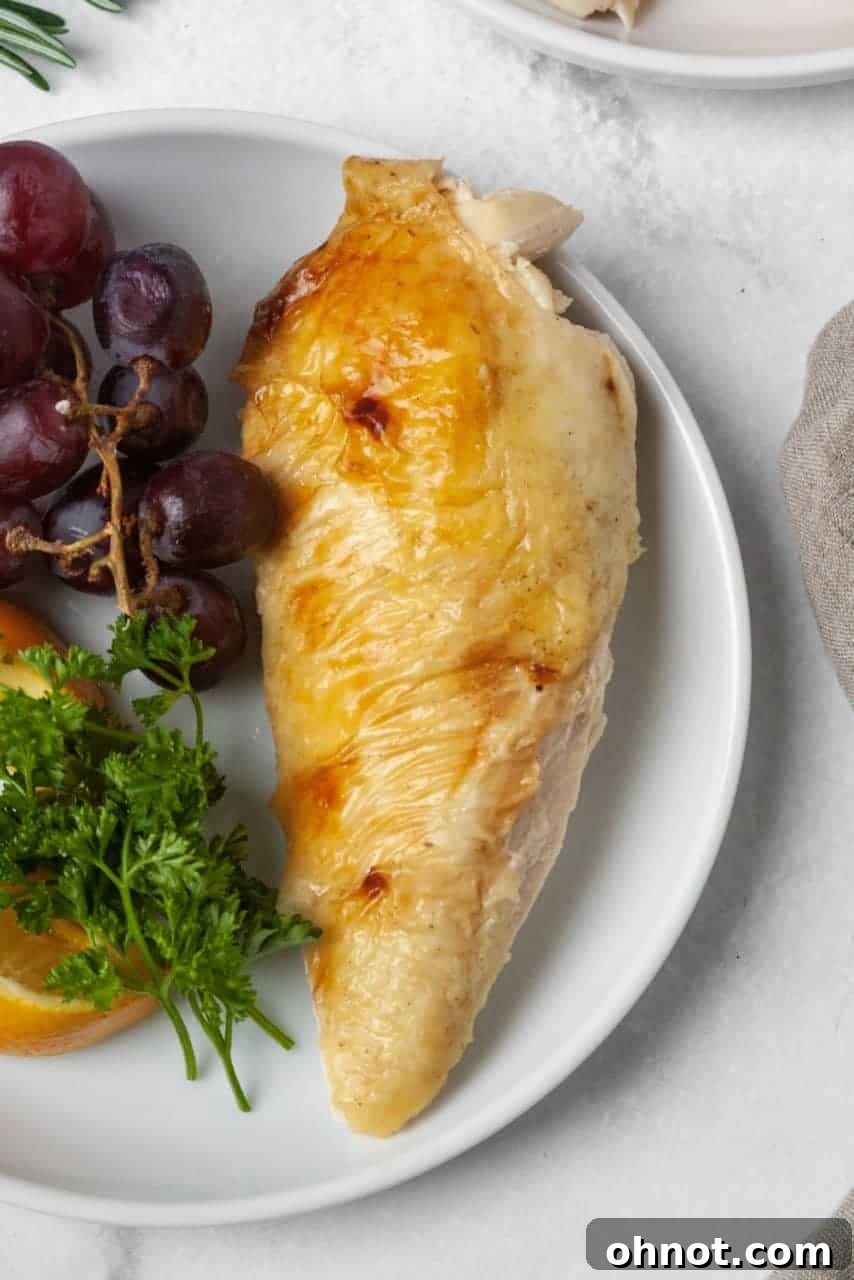 Close-up of golden brown, crispy-skinned Instant Pot whole chicken, ready to be carved