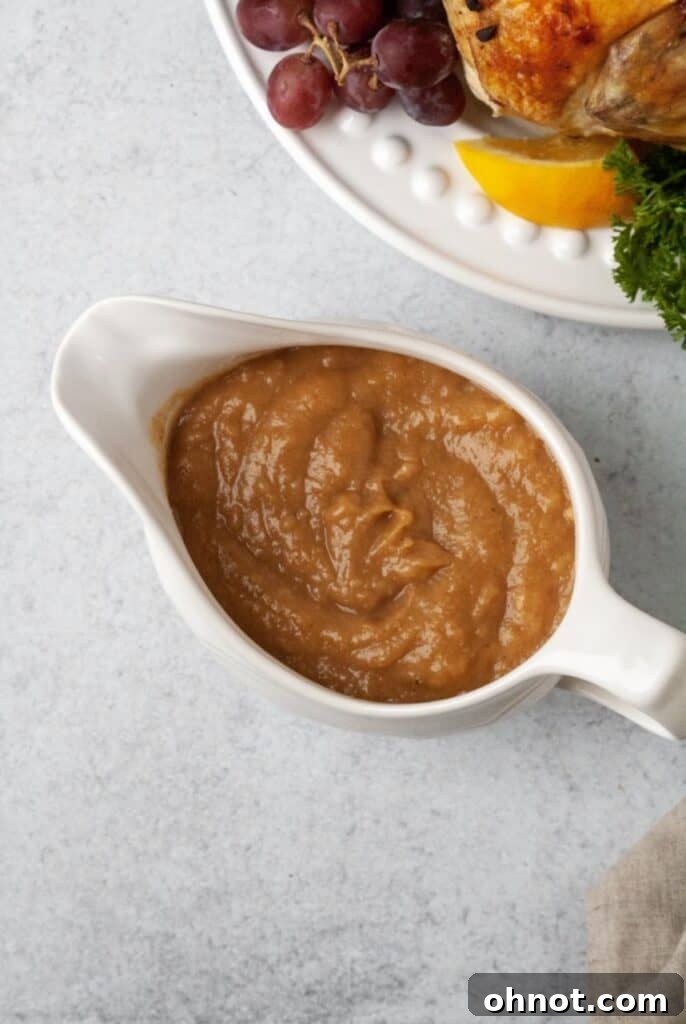 Thick Paleo gravy served elegantly in a gravy boat, showcasing its rich texture.