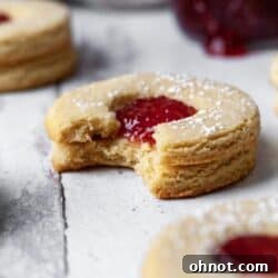 Gluten Free Linzer cookies filled with raspberry jam.