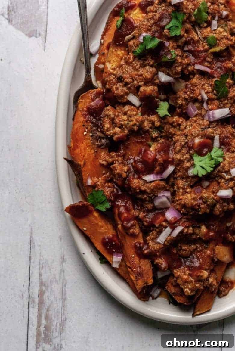 A beautifully presented serving of Whole30 Chili Fries, perfect for sharing.