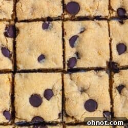 Paleo Blonde brownies cut into squares with chocolate chips.