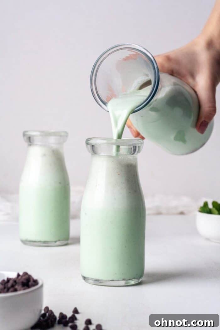 Mint chocolate smoothie in a glass jar.