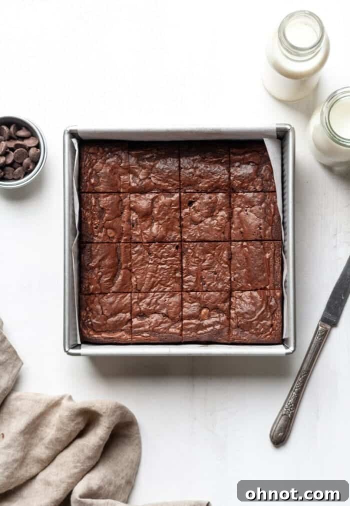 A stack of delicious grain-free brownies served with a glass of milk