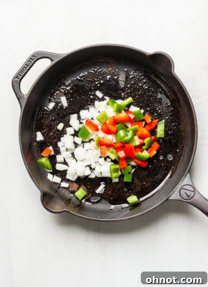 Peppers and onions in a skillet