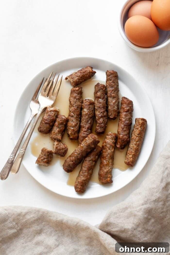 Air fryer sausage on a white plate