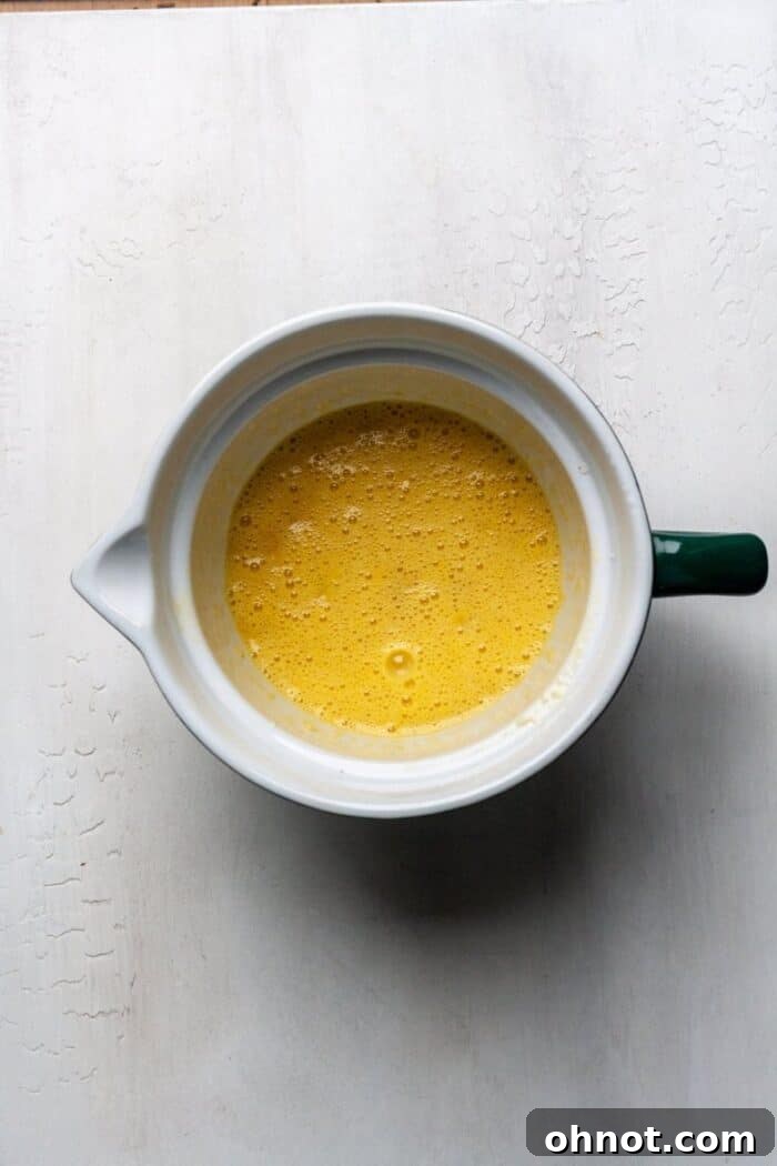 Paleo muffin batter in mixing bowl