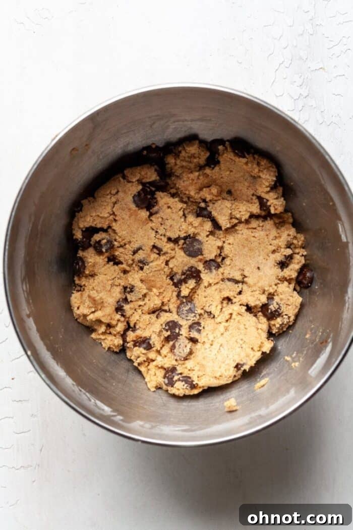 Cassava flour cookie dough with chocolate chips folded in