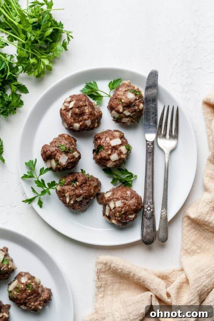 A close-up shot of cooked AIP meatballs, highlighting their texture and golden-brown exterior