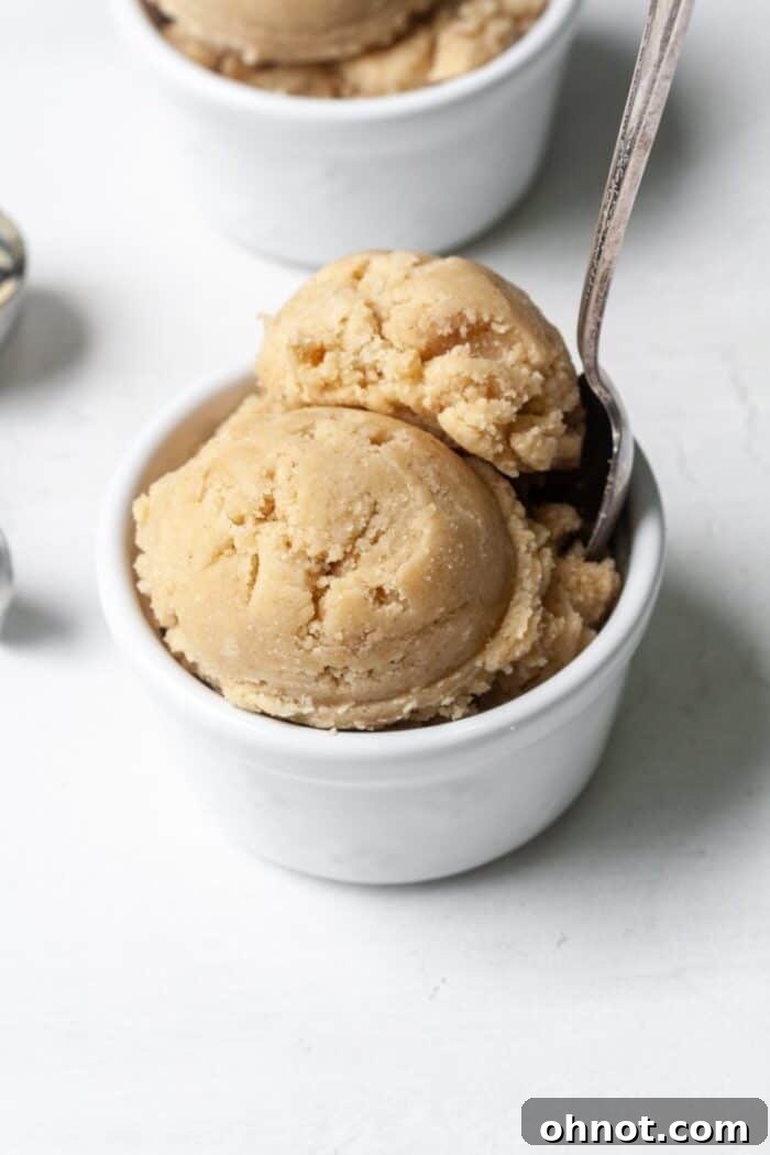 Delicious and easy edible Snickerdoodle cookie dough ready to eat in a small bowl