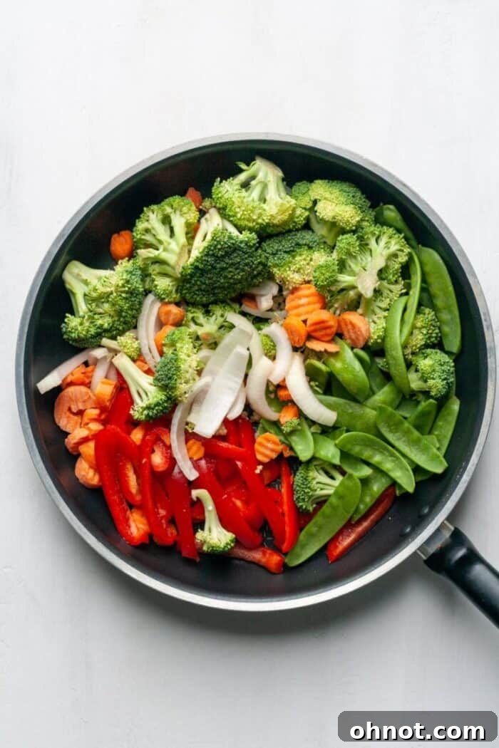 Stir fry veggies in skillet