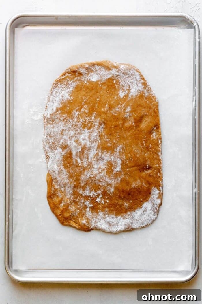 The dough rolled out into a perfect rectangle on parchment paper.
