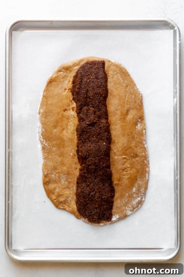 A generous line of fig filling spooned down the center of the rolled-out dough.