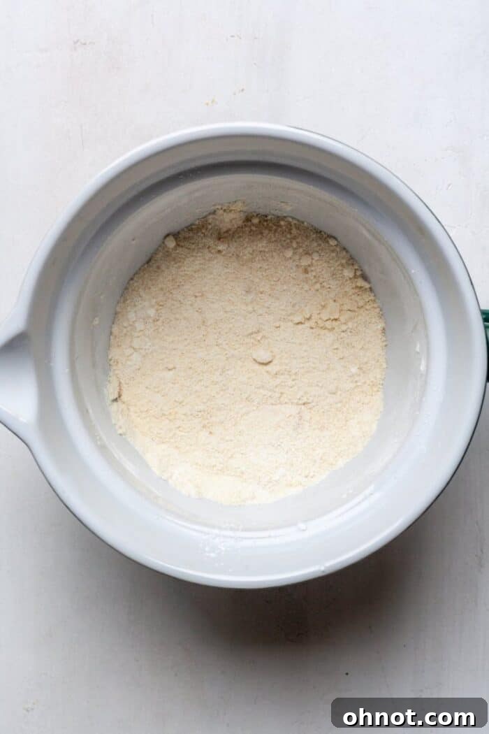 Dry ingredients for pumpkin cookies in a mixing bowl