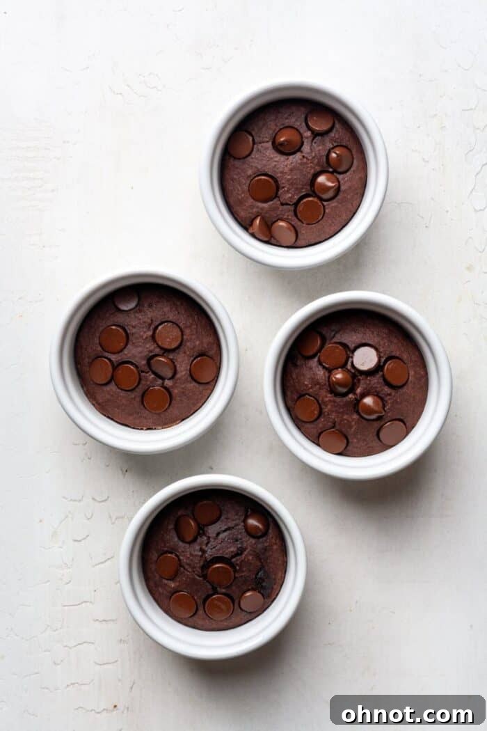 Freshly baked chocolate oatmeal cups in ramekins, hot out of the oven