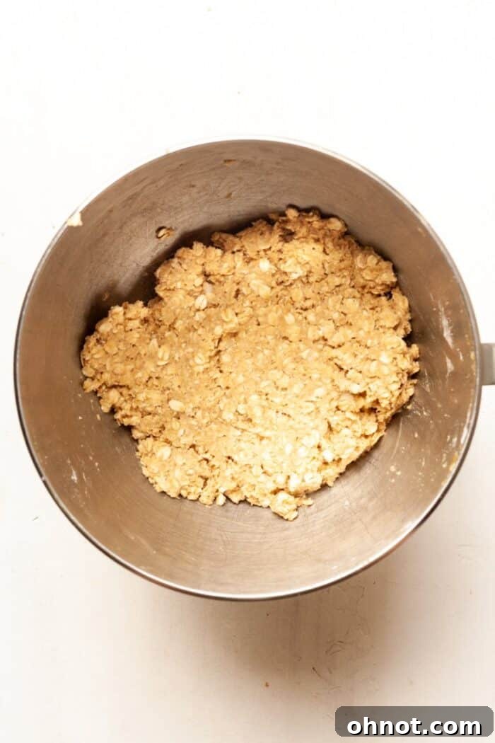 All cookie dough ingredients mixed in a bowl, before adding chocolate chips.