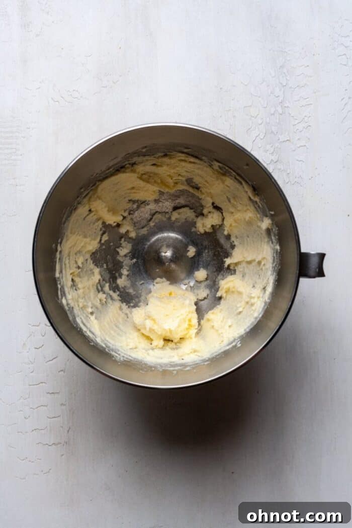 Creamed butter and sugar in a mixing bowl, light and fluffy, ready for the next baking steps to create delicious cassava flour muffins.