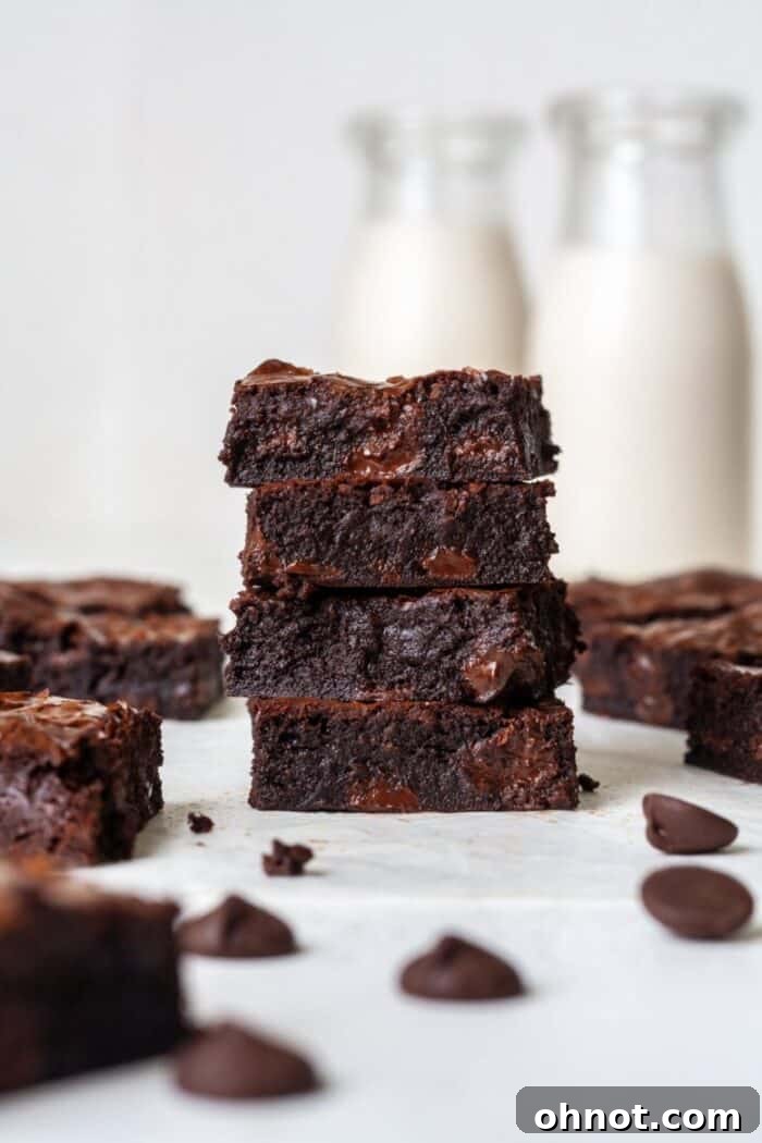 Dairy-free chocolate dessert, a rich brownie served with a glass of almond milk