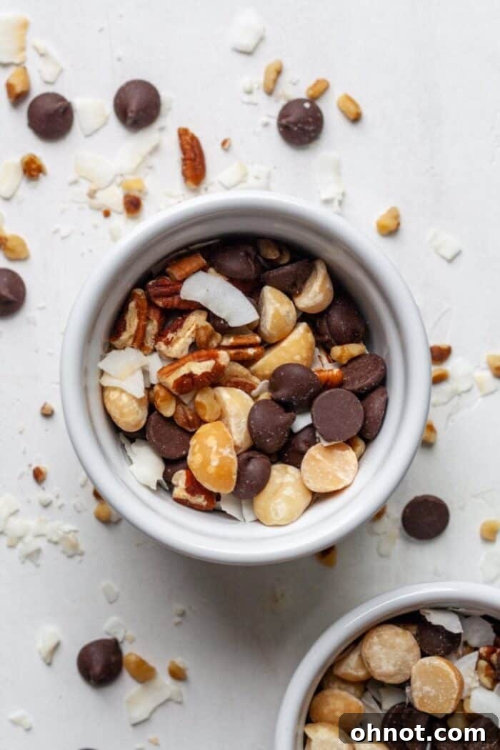 A serving of Keto trail mix in a small white bowl, ready for a healthy snack.
