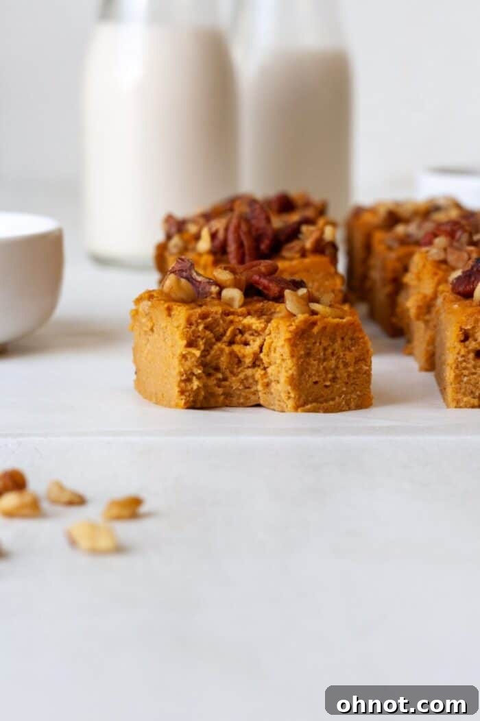Sweet potato bars elegantly arranged on parchment paper, ready to be served or stored.