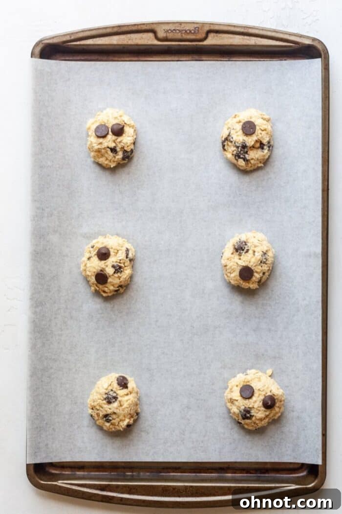 Coconut oatmeal cookies on pan