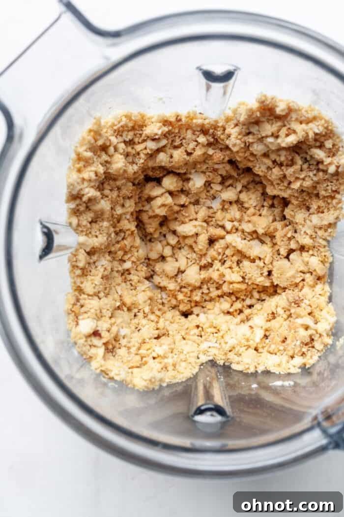 Peanuts coarsely chopped in a Vitamix blender after about 30 seconds of blending.