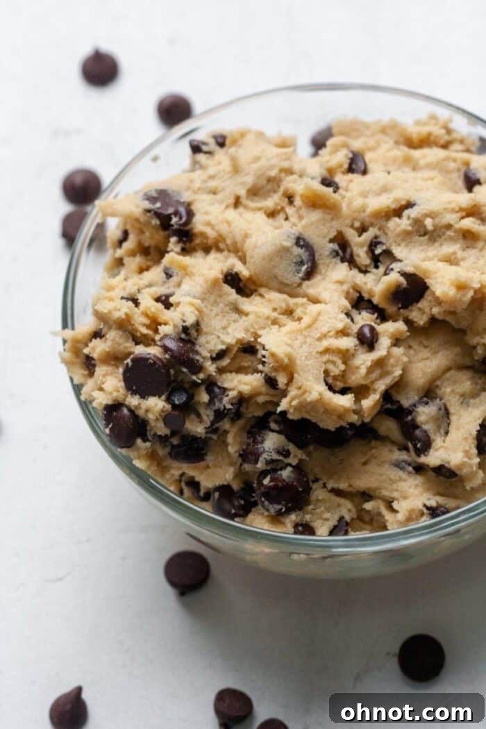 Unbaked cookie dough infused with delicious dairy-free chocolate chips.