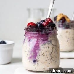 Overnight oats with frozen fruit in glass jar