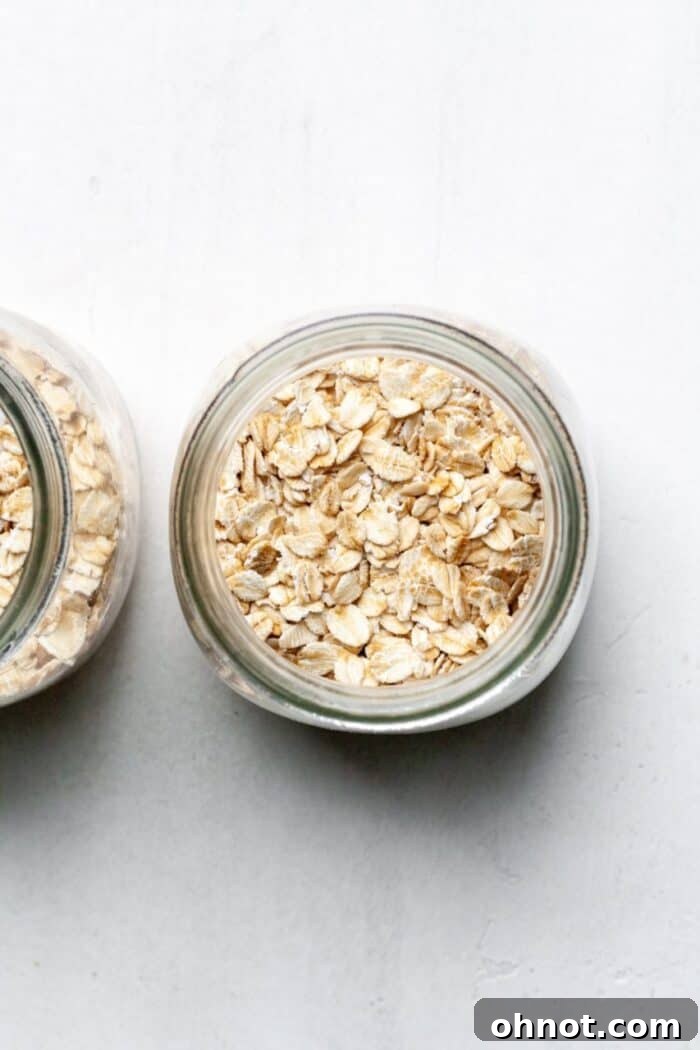 Rolled oats at the bottom of a glass jar