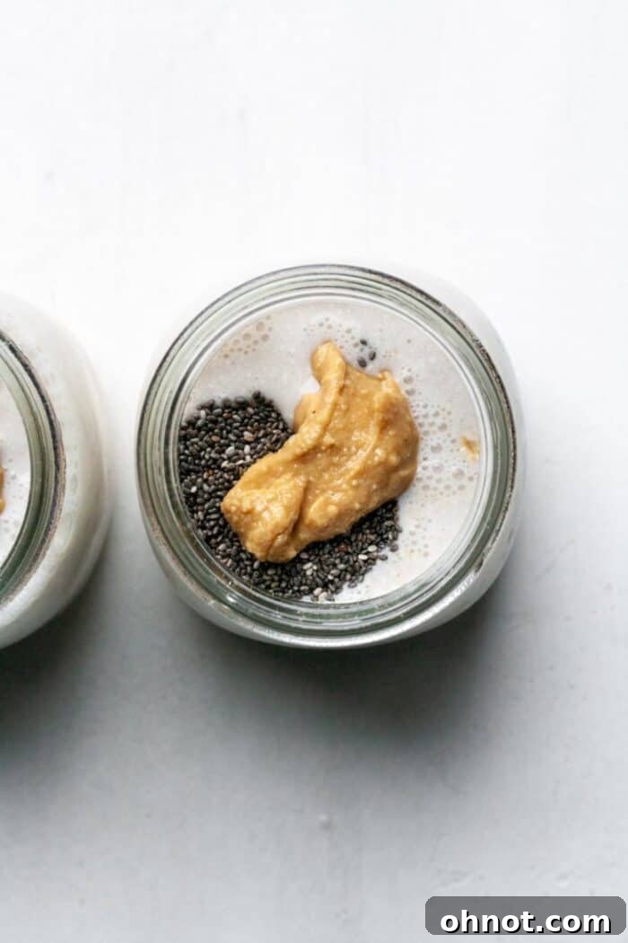 All ingredients except fruit in a glass jar before stirring