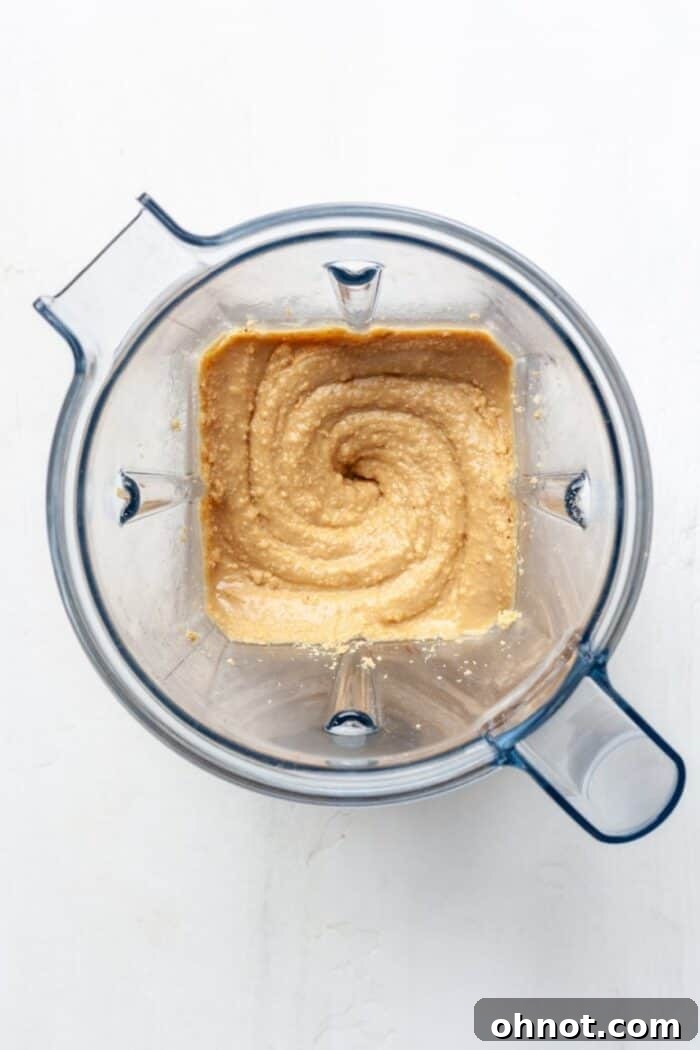 Creamy coconut peanut butter in blender
