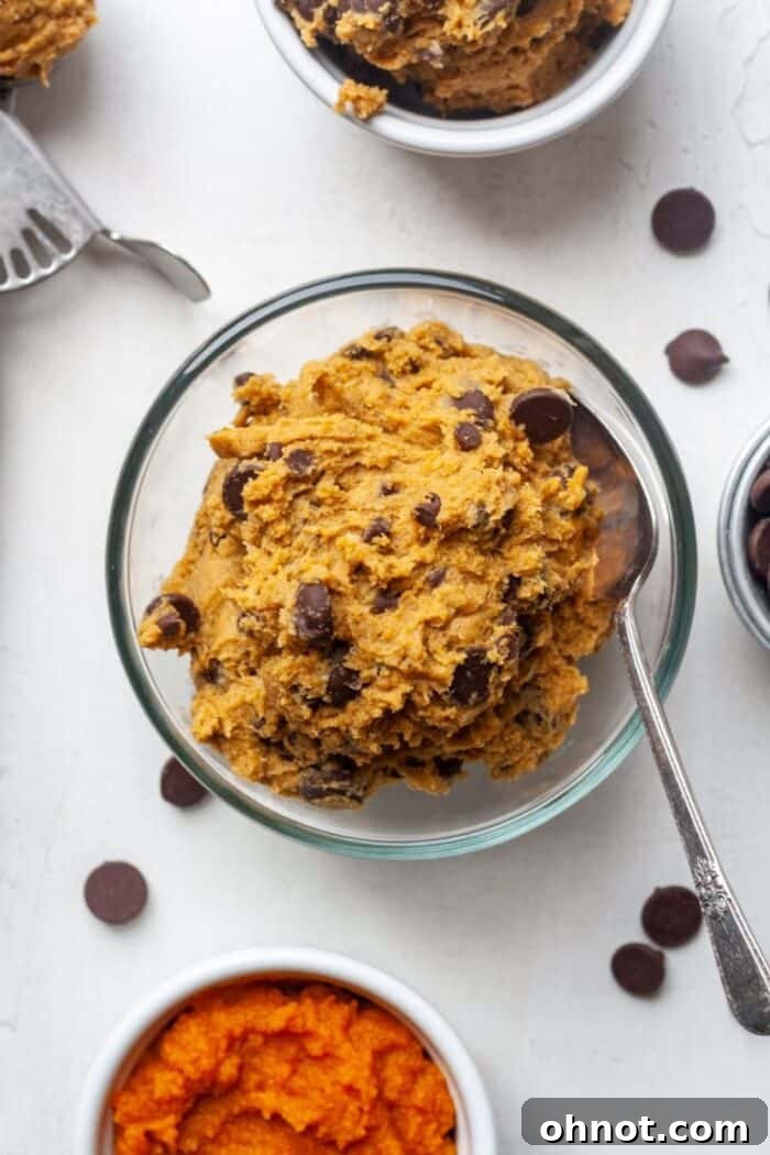 Healthy snack with chocolate chips - Edible pumpkin cookie dough in a bowl, ready to enjoy.