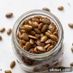 Roasted pepitas seeds in a jar