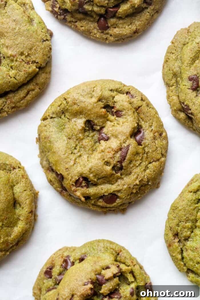 Deliciously chewy Matcha chocolate chip cookies arranged on a cooling rack