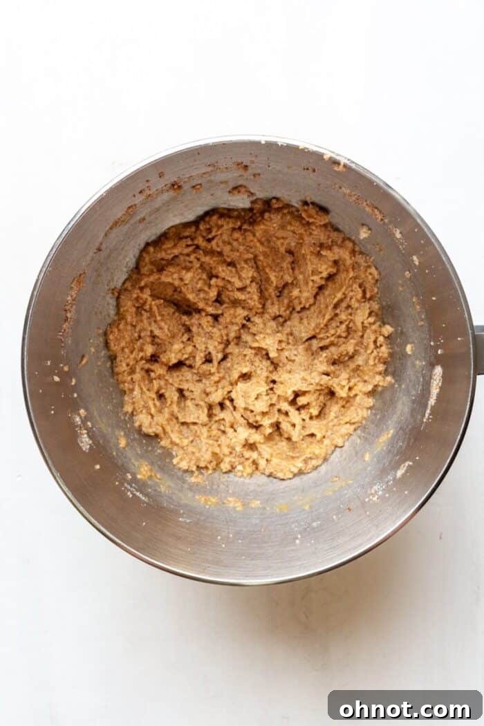 Creamed butter, sugar, and eggs mixed in a bowl